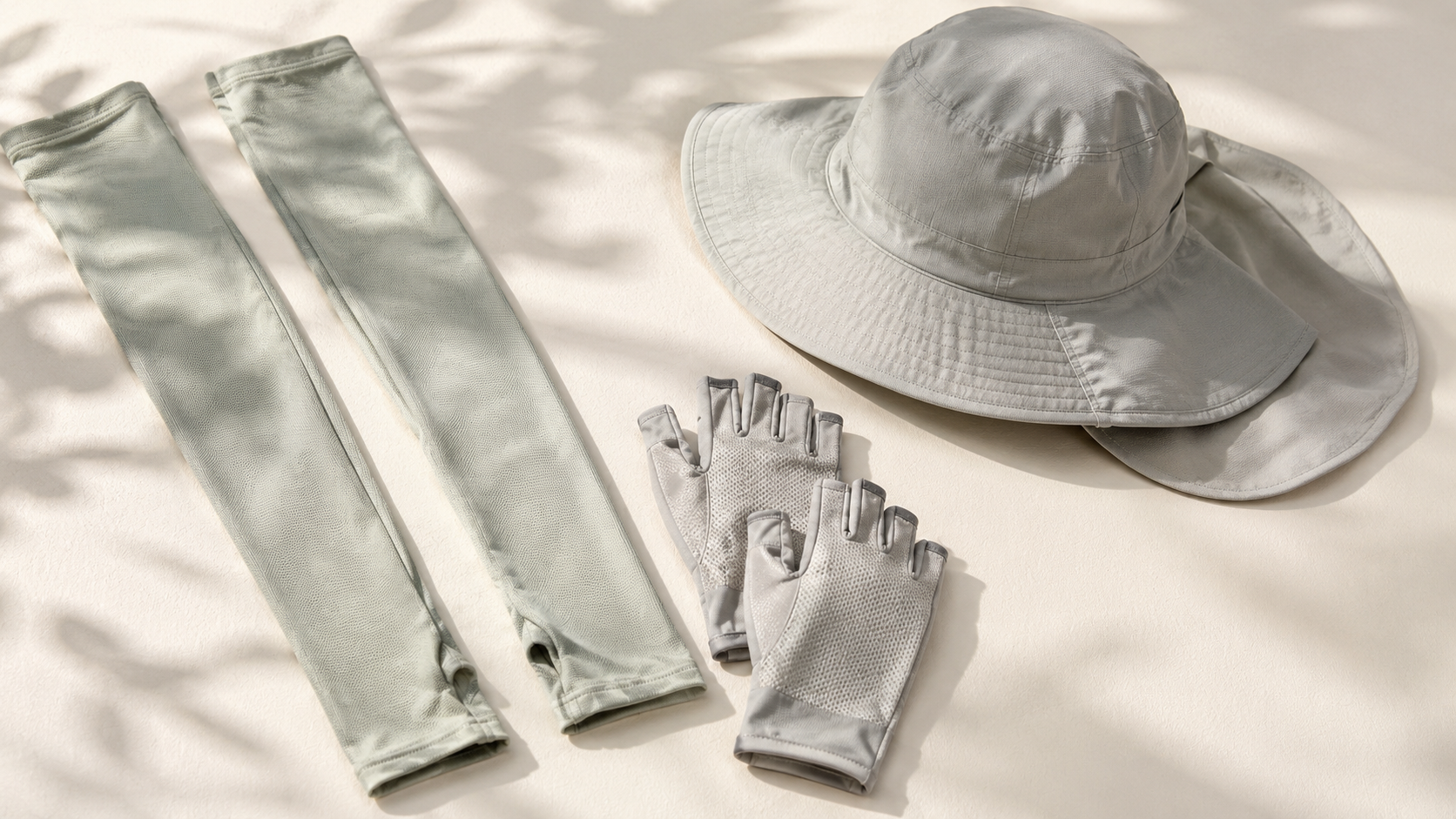Sun sleeves, gloves, and a wide-brimmed hat - physical UV protection for riders